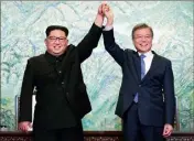  ?? (Photo AFP) ?? Incroyable : près de soixante-quinze ans après la fin de la guerre de Corée ( juillet ), les deux dirigeants se sont retrouvés hier.