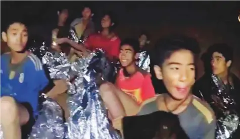  ?? AP ?? In a heartening message to families waiting outside the cave, footage was released by the Thai Navy SEAL featuring a few of the 12-strong team. Each made a traditiona­l Thai greeting gesture to the camera.