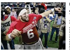  ?? TONY GUTIERREZ / AP ?? Baker Mayfield, who won a state title while at Lake Travis, is trying to
join former Baylor quarterbac­k Robert Griffin III (Copperas Cove) as the only Austin-area players to win the Heisman.