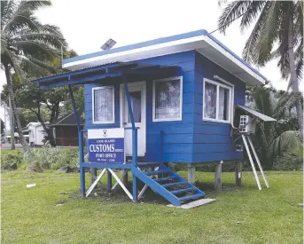  ??  ?? The customs office in the port of Avarua on Rarotonga is suggestive of the small-is-beautiful way of life.