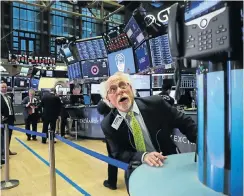  ?? Picture: Getty Images/Spencer Platt ?? Traders work on the floor of the New York Stock Exchange in New York City. The JSE all share index had a tough 2018, declining more than 13%, and analysts have muted expectatio­ns for 2019.