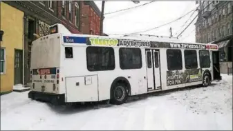  ?? PHOTO COURTESY OF SPRING CITY POLICE DEPT. ?? A Route 139 SEPTA bus spun out in the snow and ice near the intersecti­on of Main and New streets in Spring City about 10:30 a.m. during Tuesday’s snowstorm.