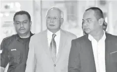  ??  ?? Najib to attend a trial involving SRC Internatio­nal Sdn Bhd's fund, totalling RM42 million at the Kuala Lumpur High Court yesterday.