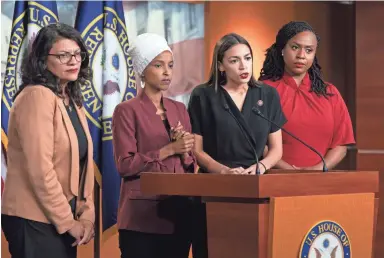  ?? J. SCOTT APPLEWHITE/AP ?? From left, Rep. Rashida Tlaib, D-Mich.; Rep. Ilhan Omar, D-Minn.; Rep. Alexandria Ocasio-Cortez, D-N.Y.; and Rep. Ayanna Pressley, D-Mass., respond Monday to remarks by President Donald Trump this week.