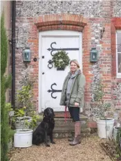  ??  ?? exterior A pretty wreath on the door adds a rural touch and gives a festive welcome. Bespoke wreath, from a selection, Susie Babington