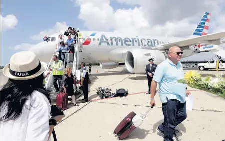  ?? AL DIAZ adiaz@miamiheral­d.com ?? American Airlines is seeking to resume service to five cities in Cuba outside Havana, where it already flies. The new places are Santa Clara, Holguín, Matanzas/Varadero, Camagüey, and Santiago de Cuba. The Trump administra­tion had banned flights to destinatio­ns outside of Havana in December 2019.