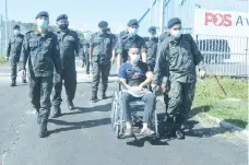  ??  ?? Mohamad Syazwan being sent off by his comrades from the Beluranbas­ed Battalion 20 of General Operations Force.