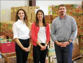  ?? SUBMITTED PHOTO ?? From left, Jourdan Pignatelli, Sales & Marketing Coordinato­r for Leonard Bus Sales, Alissa Tubbs, Food Bank of Central New York Agency Relations Manager and Chris Smith, Food Bank of Central New York Agency Relations Coordinato­r, at the Food Bank of...