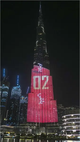  ?? Reem Mohammed / The National ?? The Mars Mission countdown lights up Burj Khalifa in Dubai last night