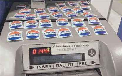  ?? KEVIN TANAKA/FOR THE SUN-TIMES ?? “I voted” stickers at a polling place in north suburban Winnetka on Tuesday.