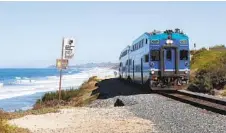  ?? K.C. ALFRED U-T FILE ?? Federal officials have not yet decided on the proposal to install a fence along the railroad tracks on the bluffs in Del Mar.