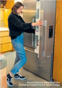  ??  ?? Alexa chooses wine from the Fisher & Paykel French Door Fridge