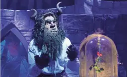  ??  ?? Beast (Tony Edgerton) contemplat­es his curse in “Beauty and the Beast.”