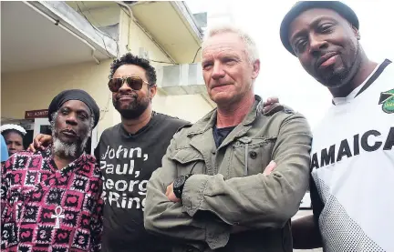  ?? STEPHANIE LYEW PHOTO ?? From left: Mutabaruka, Shaggy, Sting, and Wyclef Jean draw close for a photograph during the tour of the Bustamante Hospital for Children.