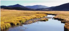  ?? SUSAN MONTOYA BRYAN/ASSOCIATED PRESS ?? The East Fork of the Jemez River cuts through Valles Caldera National Preserve. The National Park Service has proposed designatin­g significan­t geothermal features within the preserve.