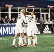  ?? Courtesy of Inter Miami ?? Inter Miami players celebrate midfielder Blaise Matuidi’s game-winning goal in a 1-0 road win against New England Revolution in the season finale on Sunday.