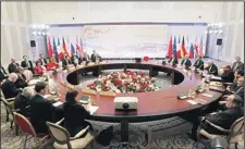  ??  ?? Top officials from the United States, France, Germany, Britain, China, Russia and Iran take part in talks on Iran’s nuclear programme in the Kazakh city of Almaty on Feb 27. World powers and Iran were due to respond today to offers presented by both...