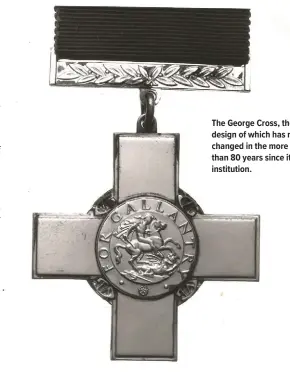  ?? ?? The George Cross, the design of which has not changed in the more than 80 years since its institutio­n.