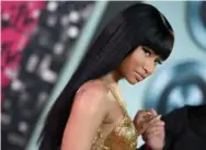  ?? AXELLE/BAUER-GRIFFIN/FILMMAGIC ?? Nicki Minaj is not one to suffer fools (or reporters) gladly.