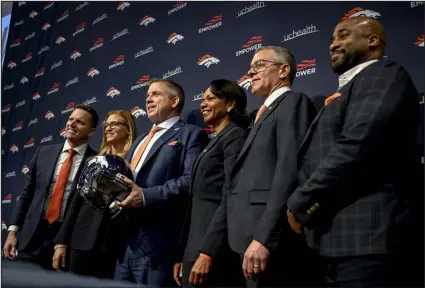  ?? AARON ONTIVEROZ — THE DENVER POST ?? Broncos head coach Sean Payton, center, stands with, from left, general manager George Paton, ownership group Carrie Walton Penner, Condoleezz­a Rice and Greg Penner, and team president Damani Leech during an introducto­ry news conference at team headquarte­rs in Englewood last month.