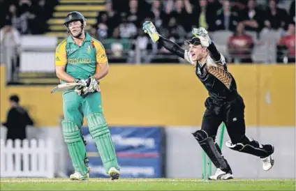  ?? Photo: Brendon O’Hagan/Reuters ?? Bitterswee­t: New Zealand’s Brendon McCullum celebrates after AB de Villiers is bowled for 29 during the T20 internatio­nal match in Auckland on February 22 2012.