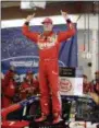  ?? NAM Y. HUH — AP ?? Kyle Busch celebrates with his crew in Victory Lane after winning a NASCAR Cup Series auto race at Chicagolan­d Speedway in Joliet, Ill., Sunday.