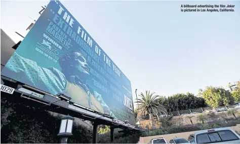  ??  ?? A billboard advertisin­g the film Joker is pictured in Los Angeles, California.