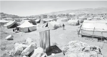  ??  ?? File photo shows tents at the Arsal refugee camp in the Lebanese Bekaa valley that hosts Syrian families who fled the conflict in Syria. — AFP photo