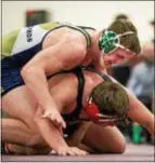  ?? NATE HECKENBERG­ER — FOR DIGITAL FIRST MEDIA ?? Sun Valley’s Hunter Catka rides Hatboro Horsham’s Nick Chapman, as Catka is on his way to a 10-1 major decision in the 220-pound final.