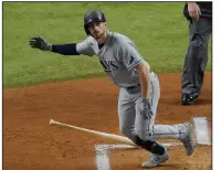  ?? (AP/Sue Ogrocki) ?? Brandon Lowe of the Tampa Bay Rays watches his home run in the first inning of the Rays’ victory over the Los Angeles Dodgers on Wednesday in Game 2 of the World Series. Lowe added a second home run in the fifth inning as the Rays evened the series at 1-1.