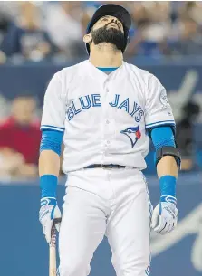  ?? MARK BLINCH/THE CANADIAN PRESS ?? The Toronto Blue Jays’ Jose Bautista reacts to striking out during the fourth inning of the Baltimore Orioles’ 4-0 win in Toronto on Thursday night.