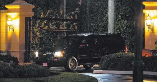  ?? Patrick Semansky The Associated Press ?? President Donald Trump’s motorcade leaves his golf club in West Palm Beach, Fla., on Sunday. Trump seeks larger aid checks than Congress approved.