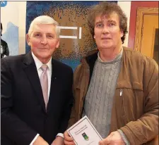  ??  ?? David Chappell from Aughrim accepts the award for Best Main Street (Medium Town) from Cllr Pat Vance.