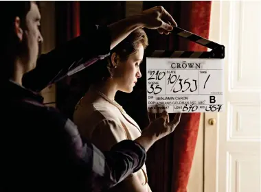  ??  ?? royal act: Claire Foy shooting series two of The Crown and, below right, with Matt Smith as Prince Philip