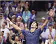 ?? Julio Cortez / Associated Press ?? Novak Djokovic celebrates after defeating Juan Martin del Potro in the men’s final of the U.S. Open in 2018.