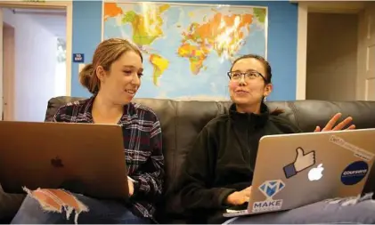  ?? Ray Chavez/Bay Area News Group/TNS ?? Make School student Lauren Weiss, 18, gets feedback from instructor Karlygash Zhuginisso­ova, 25, as she works on a health app as part of her project at the school on July 12 in San Francisco.