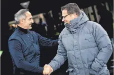  ?? FOTO: MARIUS BECKER/DPA ?? Freut sich auf die Zusammenar­beit mit Trainer Adi Hütter (links): Gladbachs Sportdirek­tor Max Eberl (rechts).