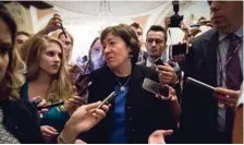  ?? (Photo by J. Scott Applewhite, AP) ?? Sen. Susan Collins, R-Maine is surrounded by reporters on Capitol Hill in Washington, Thursday, July 13, 2017, after a revised version of the Republican health care bill was announced by Senate Majority Leader Mitch McConnell of Ky. The bill has faced...