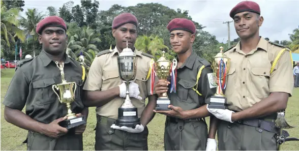  ?? Photo: Shratika Naidu ?? From left: Monfort Technical Institute Best Cadet- Elia Laivou, Best Platoon- Group 2- Aubrey Manoa, Best Overall Discipline- Mikaele Lawaeli and Best Overall Semi Batilumiil­umi with their trophies and awards after the passing-out parade at the...