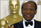  ?? DOUG MILLS — THE ASSOCIATED PRESS ?? Sidney Poitier poses xith his honorZry OscZr during the 7gth ZnnuZl AcZdemy AxZrds in Los Angeles in 2002.