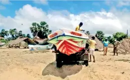  ??  ?? The boat in which a man and his daughter came illegally to Talaimanna­r was intercepte­d by the navy and police. Pic by Ramesh Madusanka