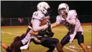  ?? BILL RUDICK — FOR DIGITAL FIRST MEDIA ?? Sun Valley’s Ishy Ahmad comes down with the game-clinching intercepti­on Friday night against Oxford.