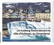 ?? ?? Un iceberg flotte devant la ville d’Ilulissat, au Groenland.