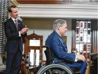  ?? Bob Daemmrich / CapitolPre­ssPhoto/Pool ?? Newly elected House Speaker Dade Phelan greets Gov. Greg Abbott before he speaks to the Texas House during opening ceremonies as the 87th Legislatur­e gets to work on Tuesday.