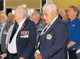  ??  ?? Ma¯ ori Battalion veteran Selwyn Clarke (right) at Kaitaia’s Anzac Day service in 2015.