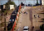  ?? ROGAN WARD/REUTERS ?? A general view of the street after violence erupted following the jailing of former South African president Jacob Zuma in Hillcrest, South Africa, on July 14, 2021.