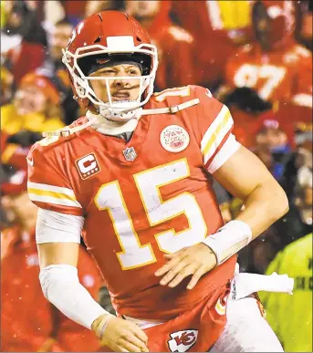  ?? John Sleezer / TNS ?? Chiefs quarterbac­k Patrick Mahomes celebrates after running back Darrel Williams ran in a fourth-quarter touchdown against the Colts during an AFC Divisional playoff game on Saturday.