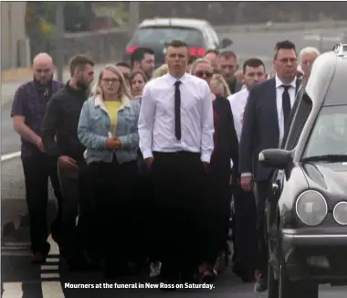  ??  ?? Mourners at the funeral in New Ross on Saturday.