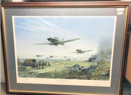  ??  ?? > ‘Adlertag, August 1940’, a signed and numbered limited edition print for the 50th anniversar­y of the Battle of Britain, by Frank Wootton, signed by RAF fighter pilots