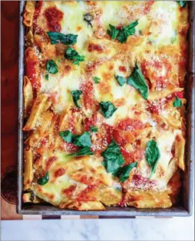 ?? PHOTO BY ALLISON AREVALO ?? Baked Trenne with Fresh Mozzarella and Basil is one of the 24 dinners Allison Arevalo has hosted at her Rockridge home as part of her Pasta Friday movement to unite friends at the end of the week.